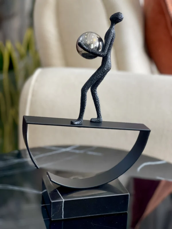 Balance Acrobatic Man Holding A ball