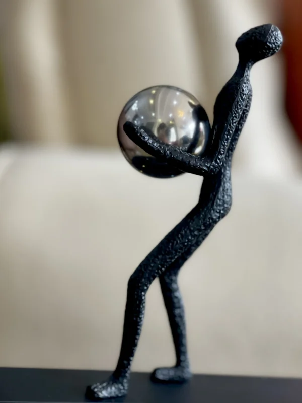 Balance Acrobatic Man Holding A ball