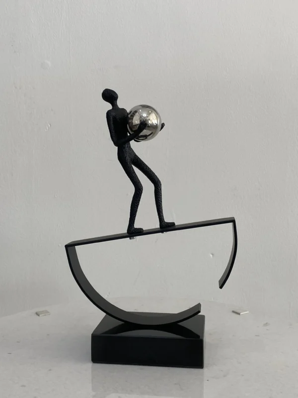 Balance Acrobatic Man Holding A ball